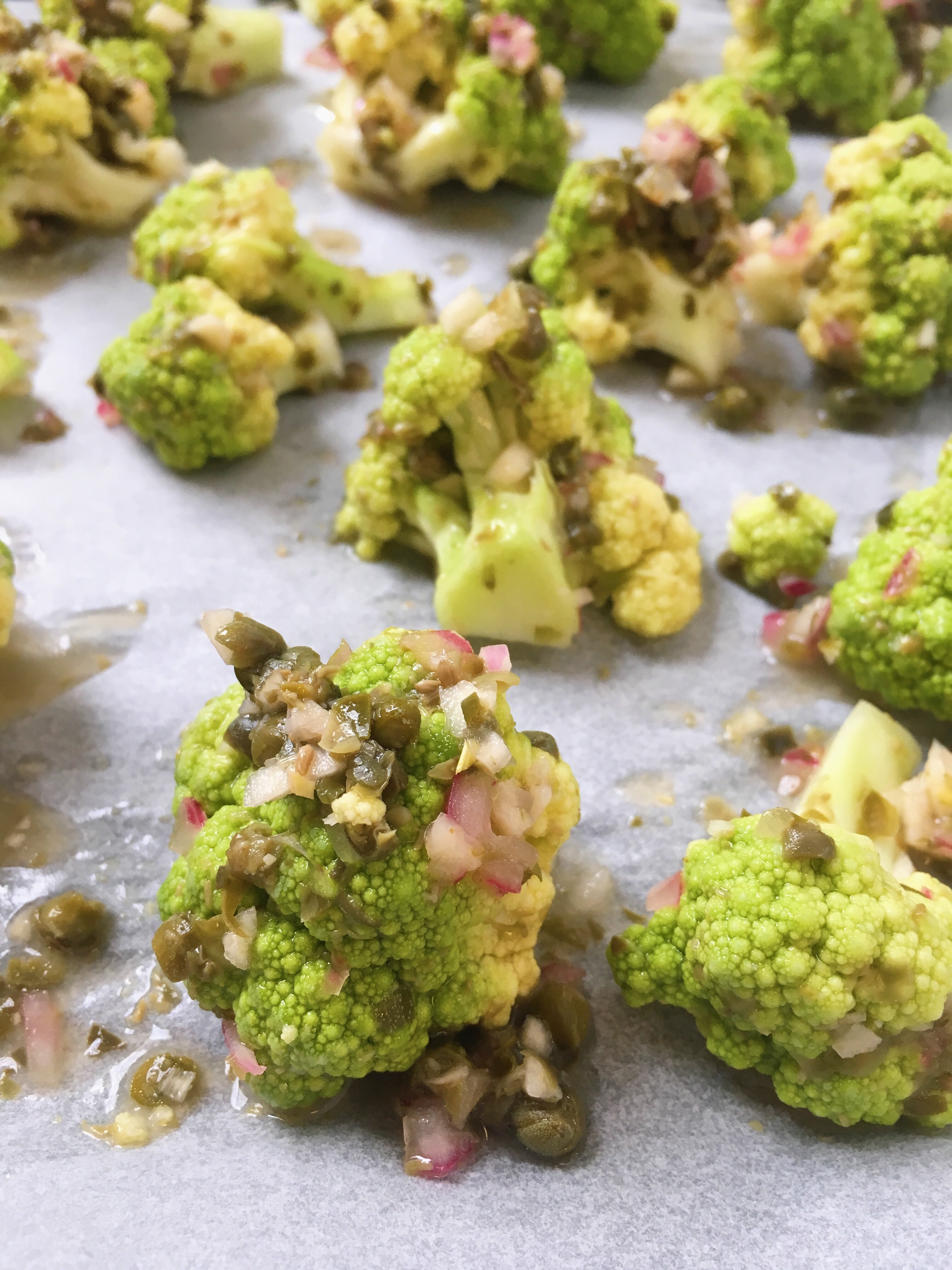 Green cauliflower with capers and seasoning