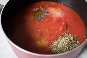 Tomatoes with the pepper, salt, basil, and orange juice