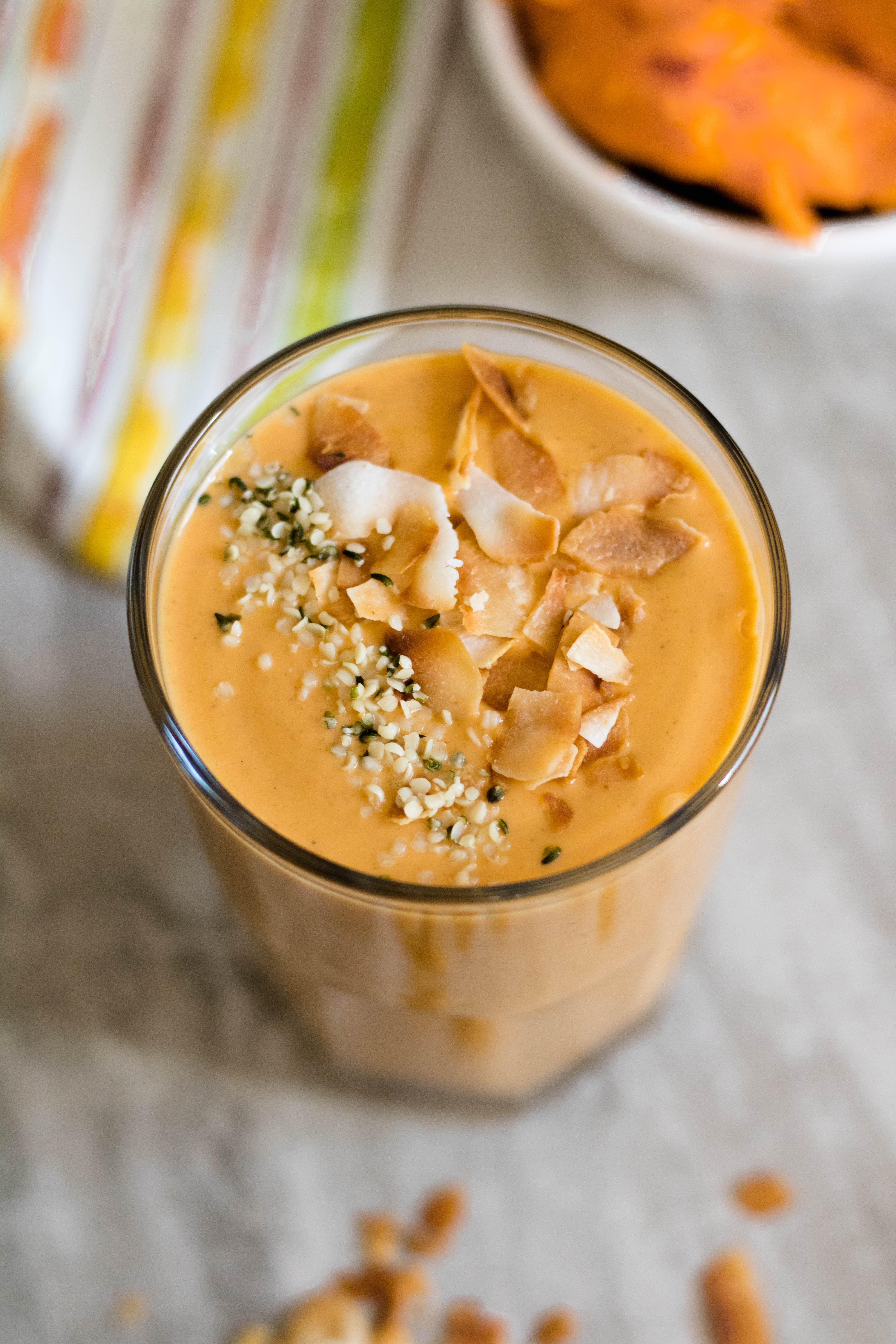 Sweet potato in a smoothie topped with hemp seeds and coconut flakes!