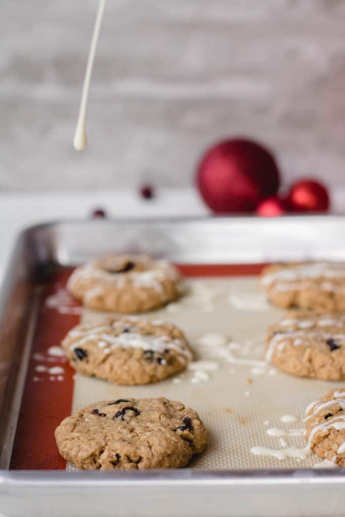 White chocolate drizzle on top of the oatmeal cranberry cookies