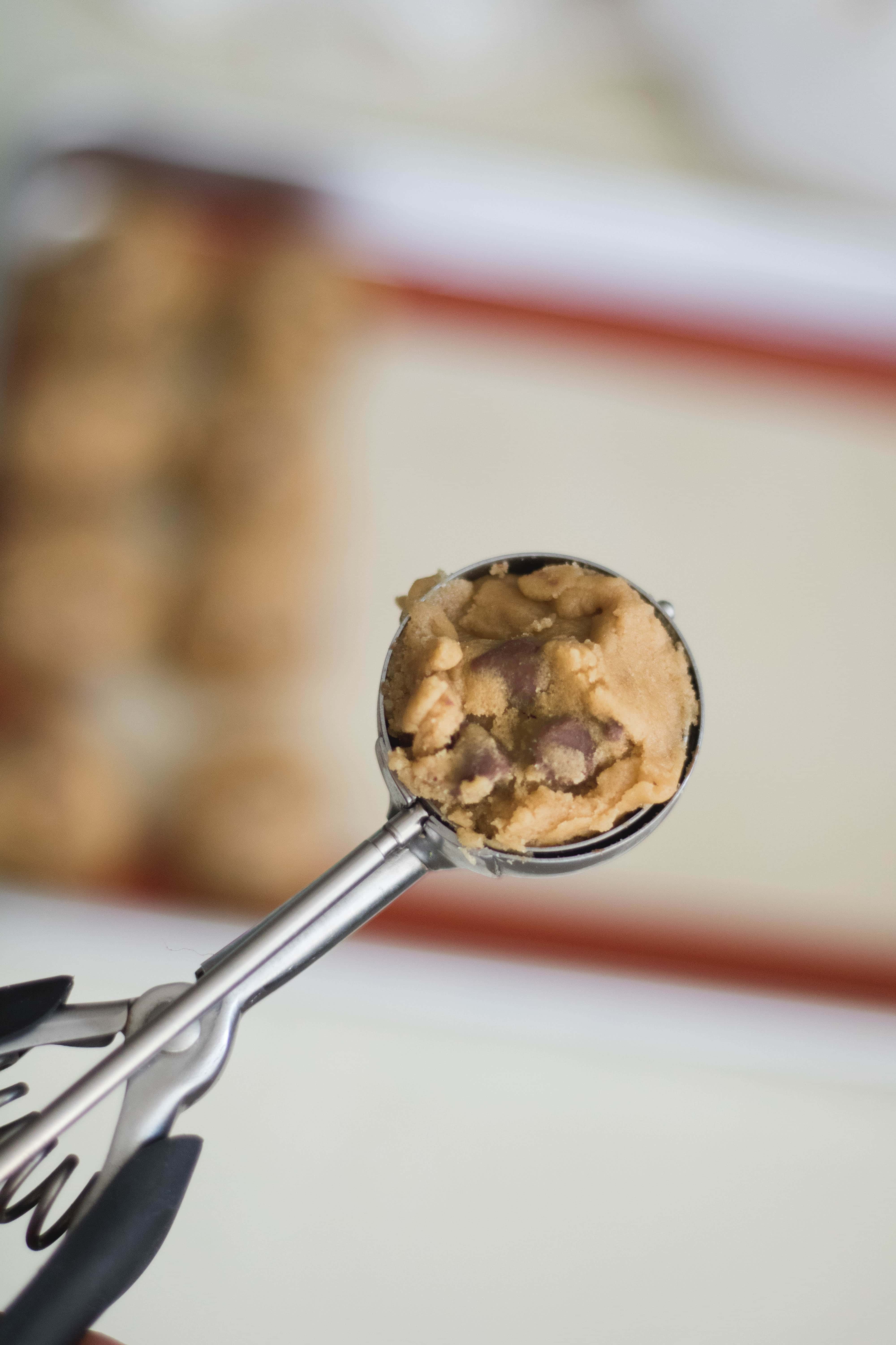 a scoop of the chewy and soft chocolate chip cookies