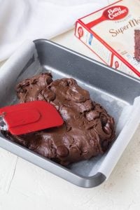 Spreading brownie batter in the baking pan