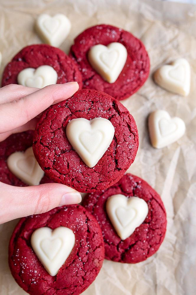 Red velvet sugar cookies with hearts on top for the best valentine's day cookie ideas