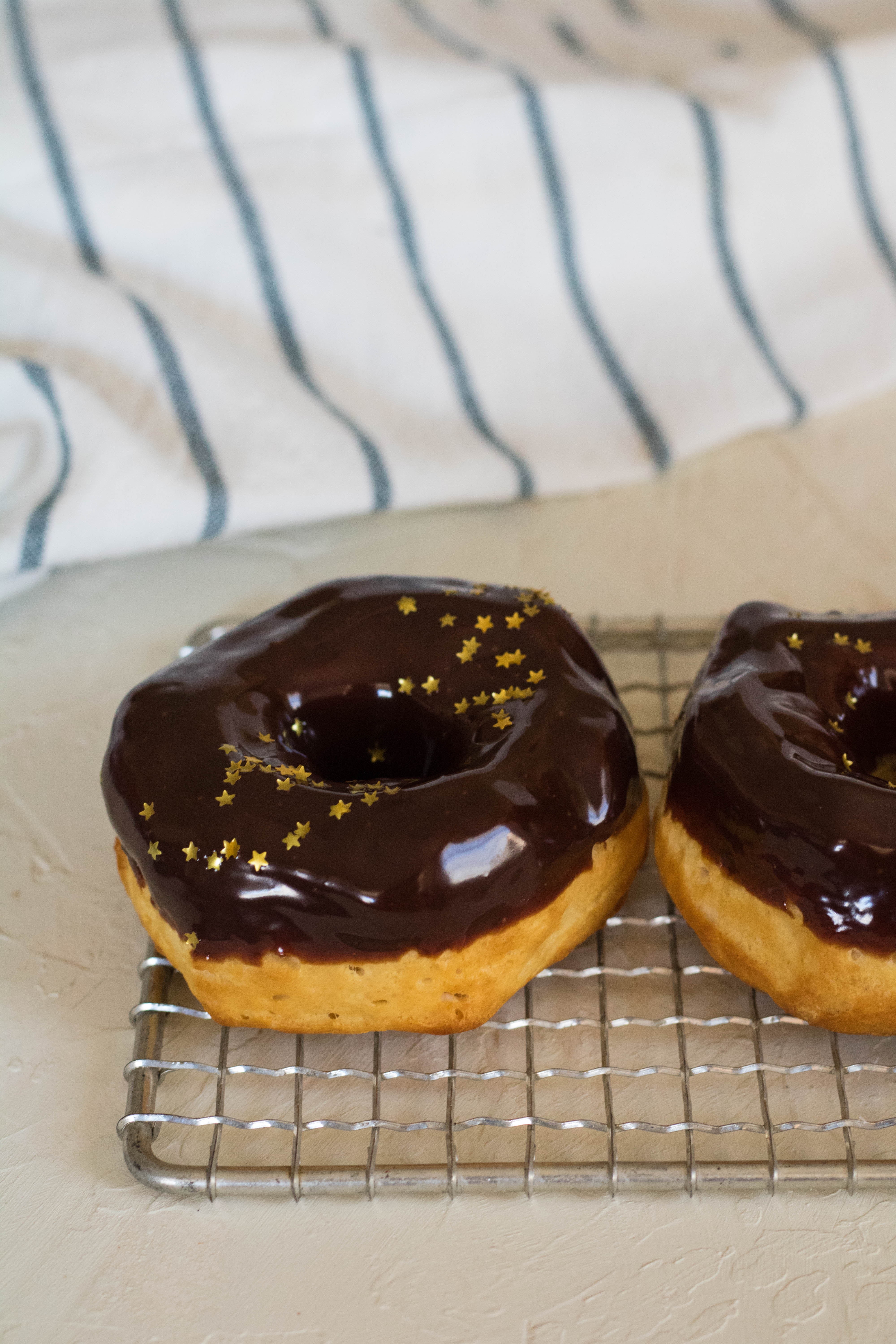 air fryer biscuit donuts with chocolate ganache and golden stars