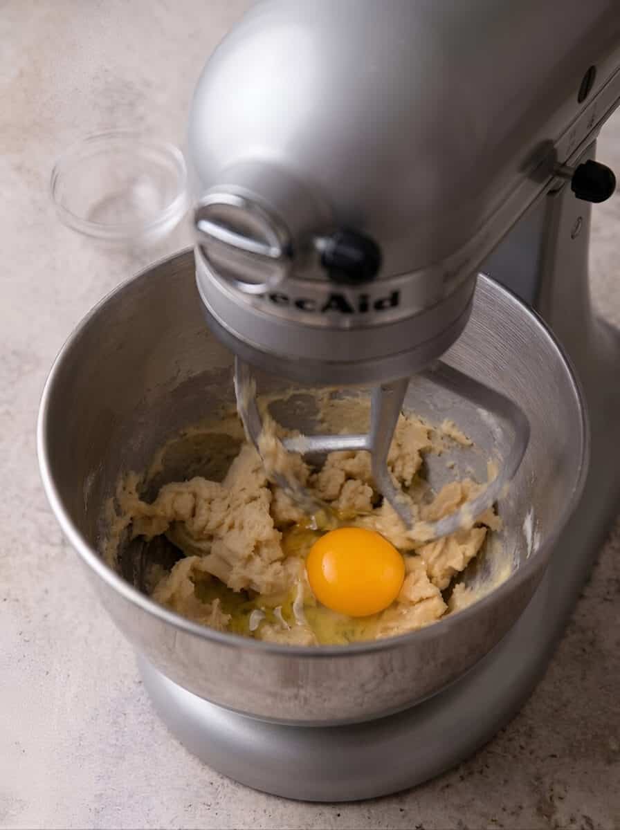 Choux dough beaten in a stand mixer bowl with an egg added it once it cooled down.