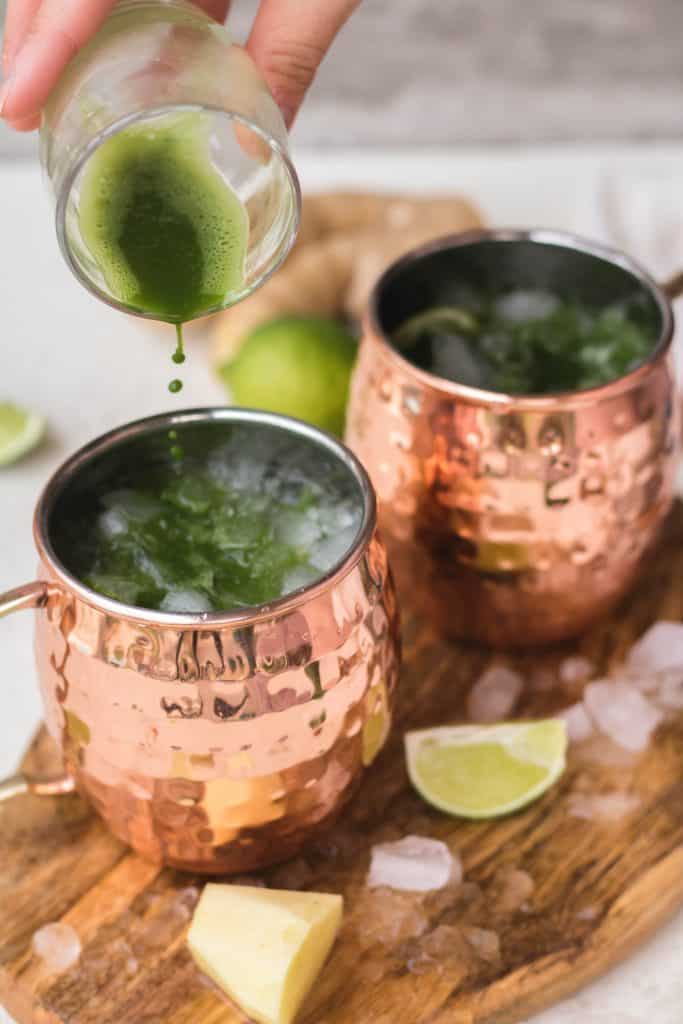 Pouring matcha in Moscow mule