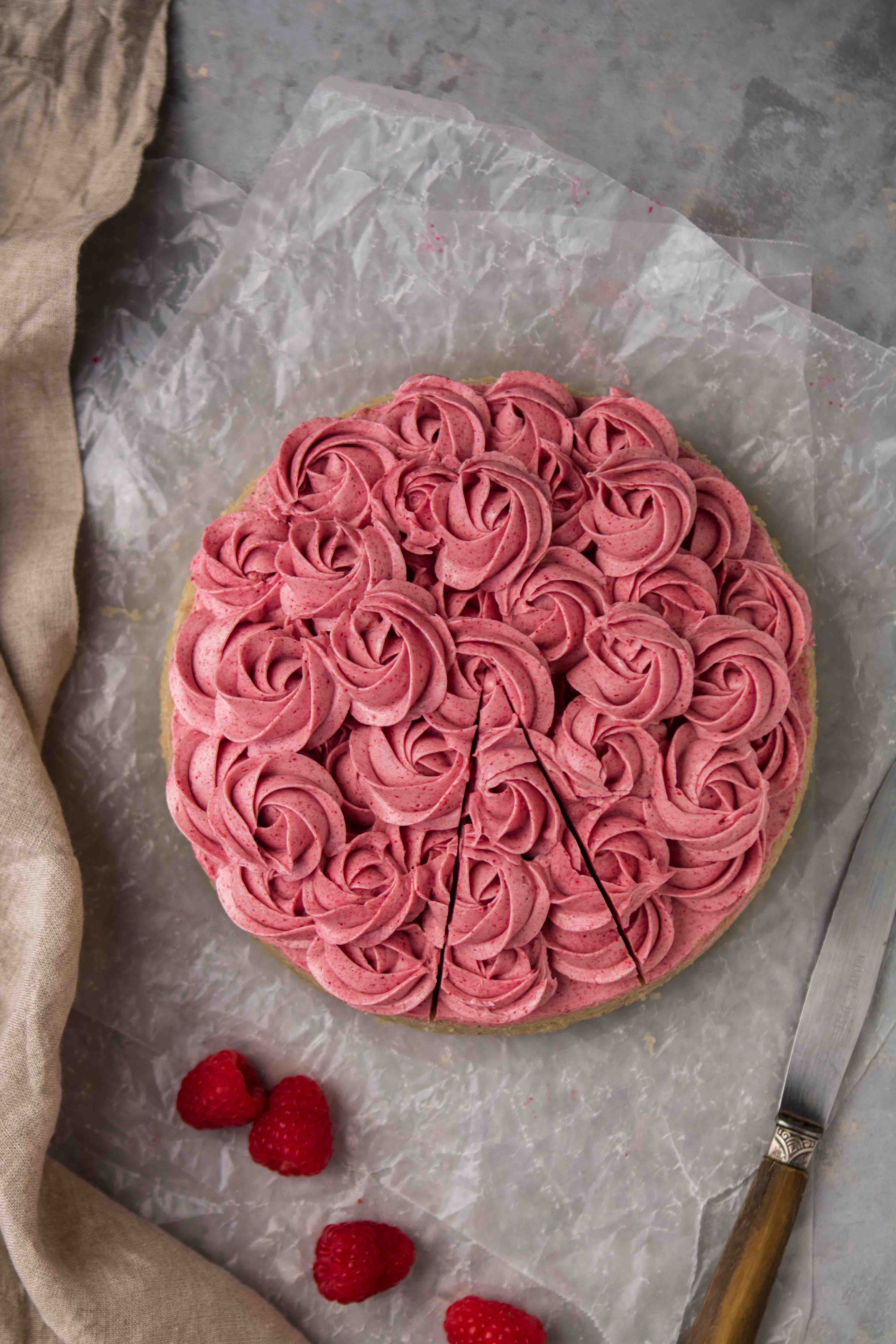 Delicious pink raspberry frosting on butter cake
