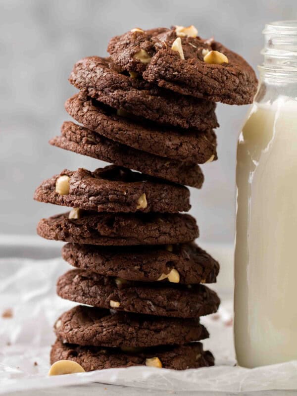 Easy brownie hazelnut cookie stack next to milk