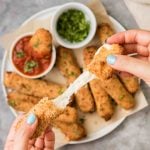 Air fryer cheese stick with cheese oozing out