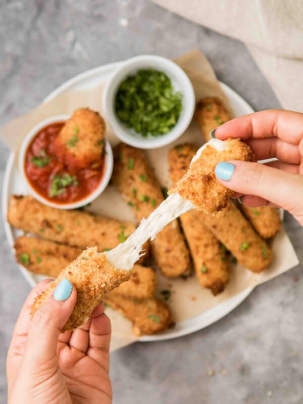 Air fryer cheese stick with cheese oozing out