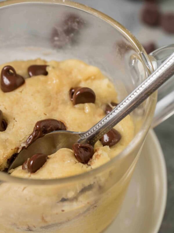 Close up of the out of this world microwave chocolate chip cookie in a mug