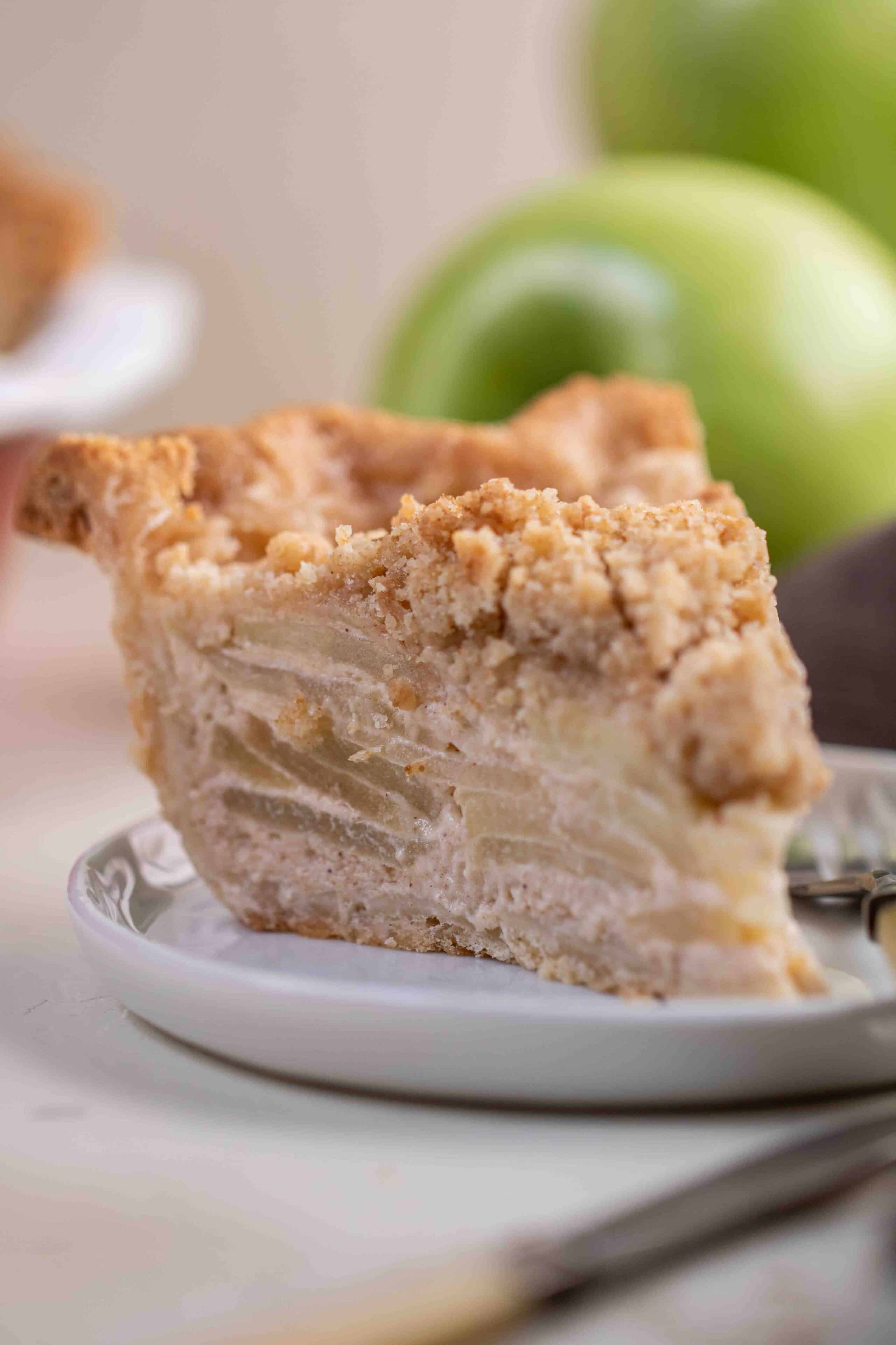 close up of apple pie with crumb topping