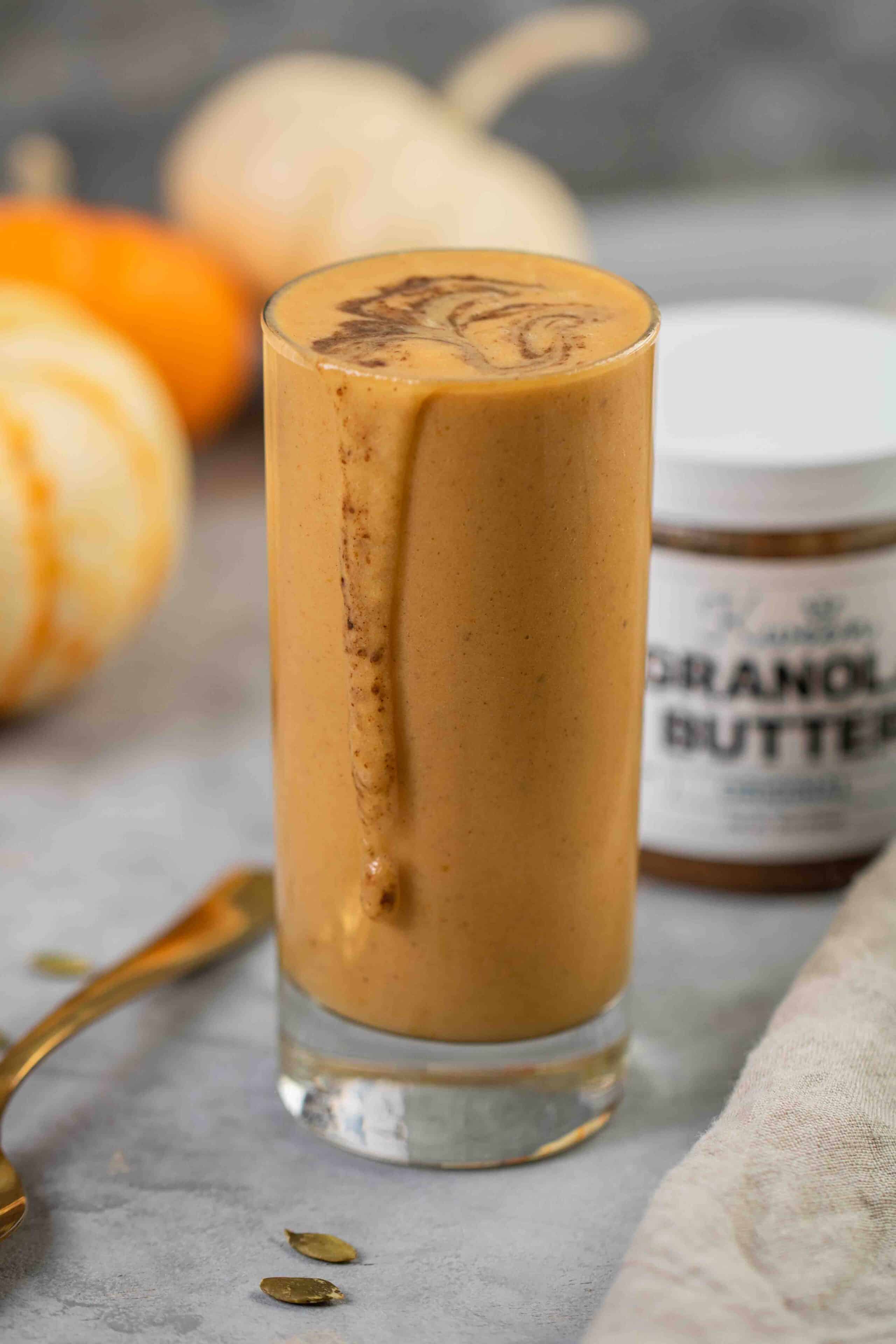 Easy pumpkin smoothie with a drip on the side