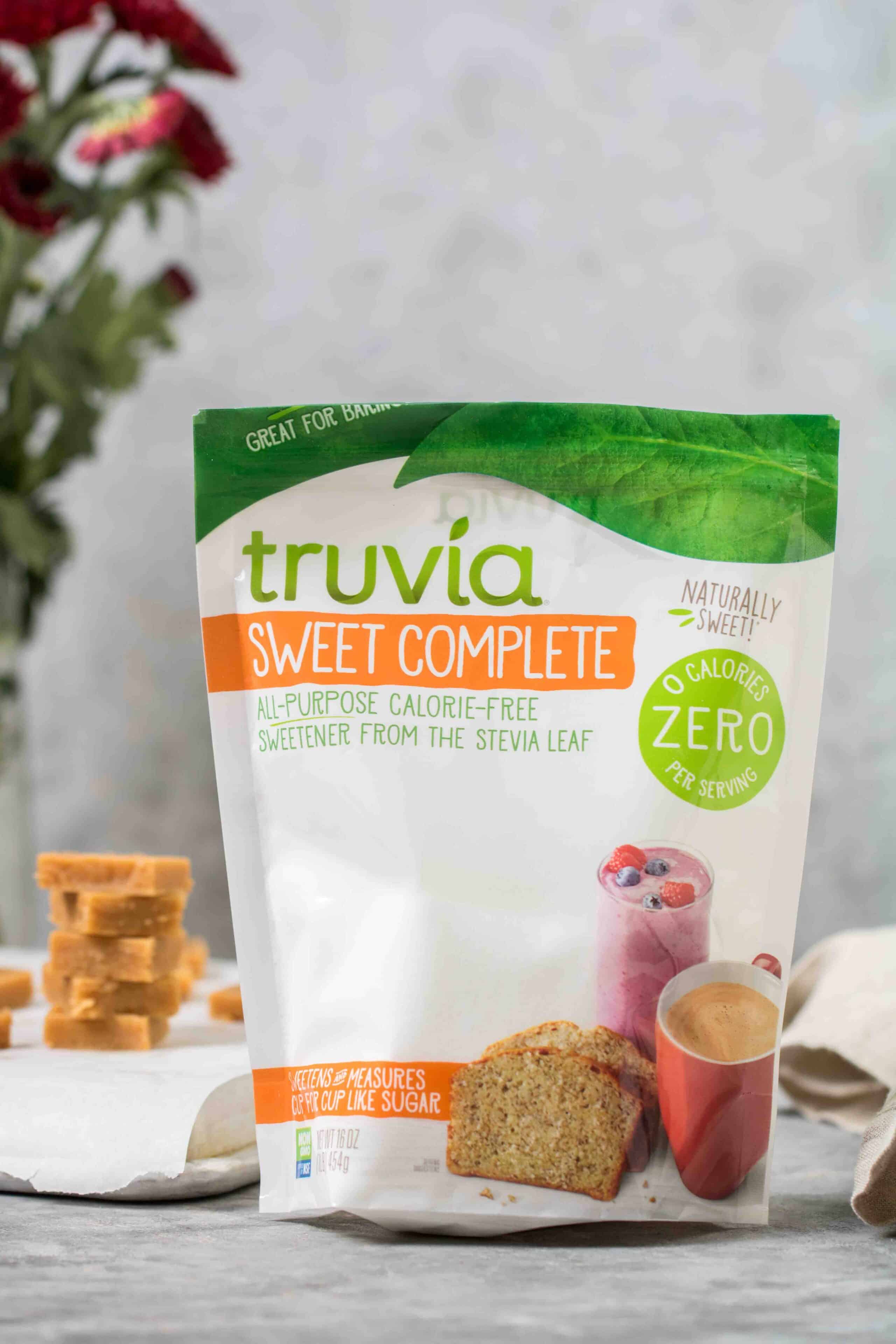 Close up of truvia sweet complete sugar with keto peanut butter fudge behind
