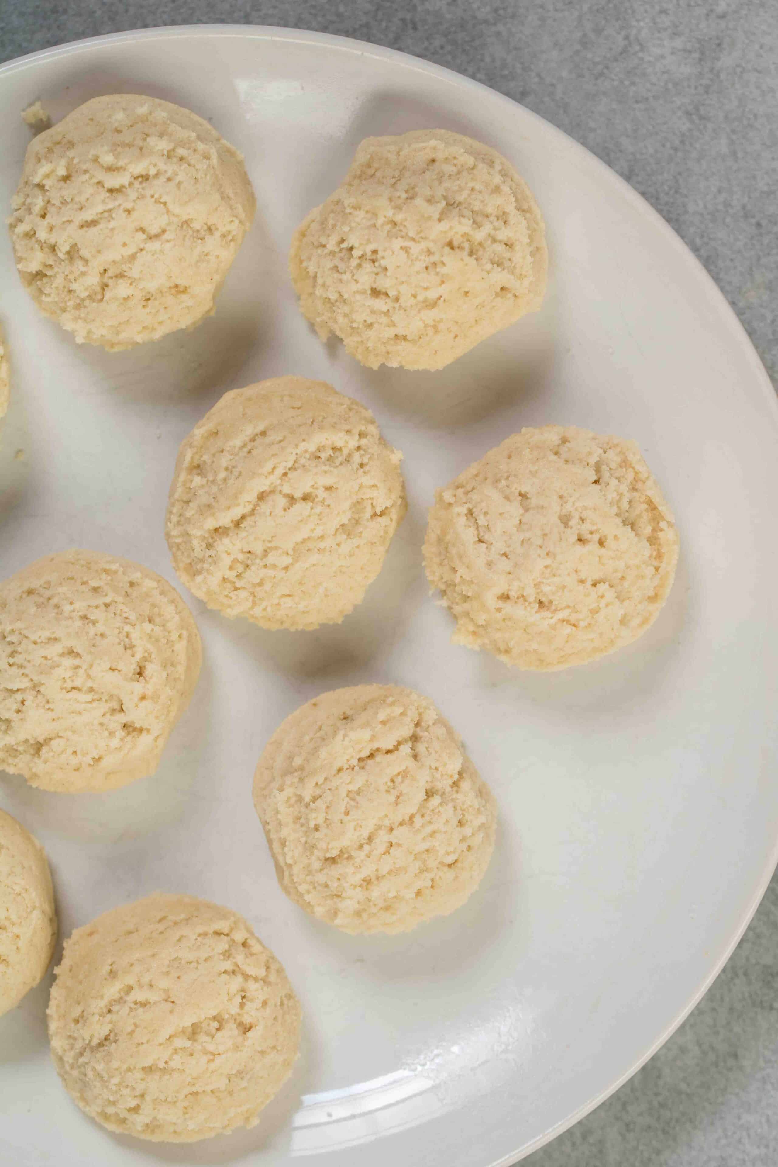 vanilla sugar cookie dough balls on a plate