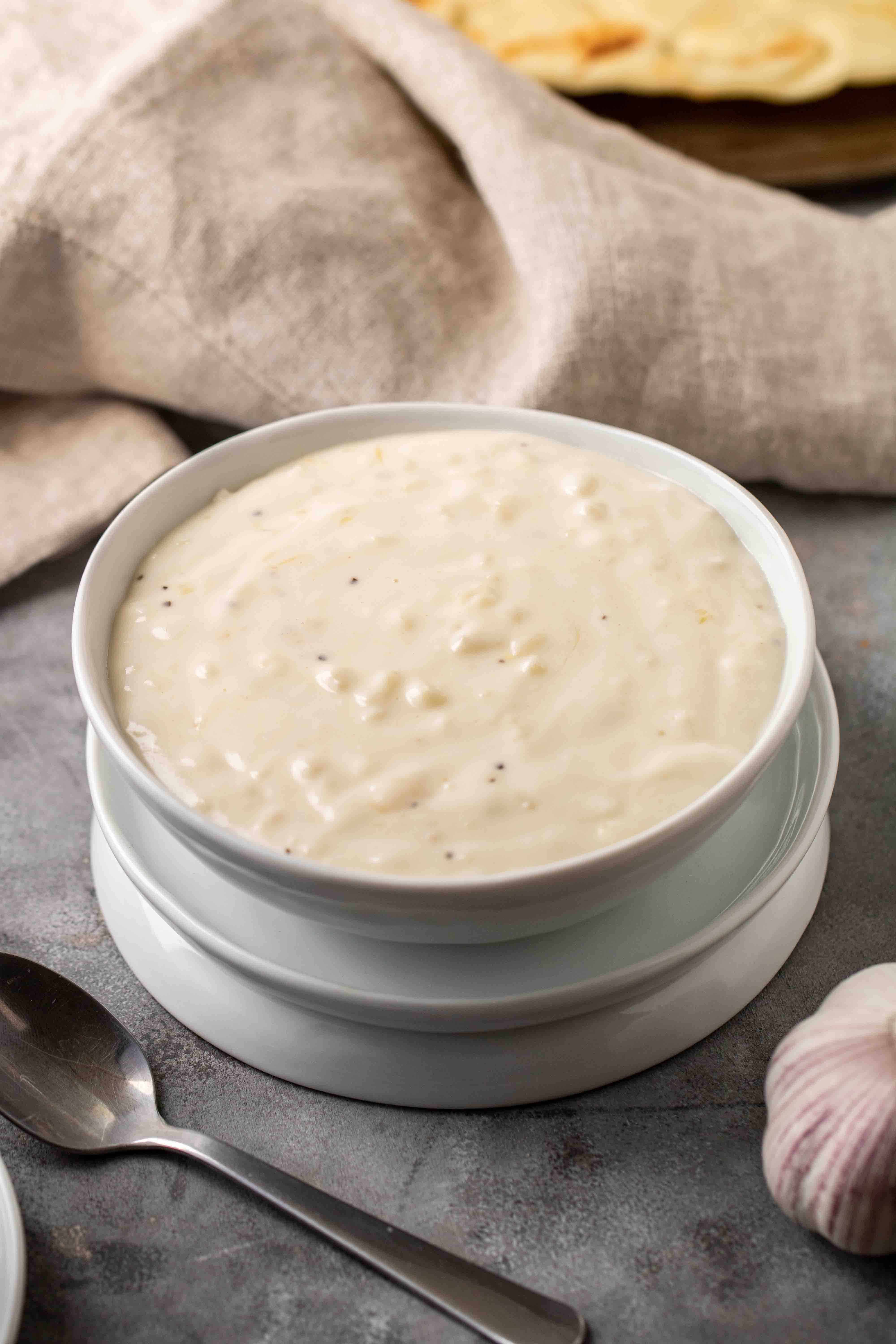 Garlic white pizza sauce in a small bowl