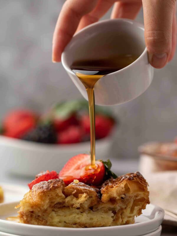 Croissant french toast drizzled with maple syrup