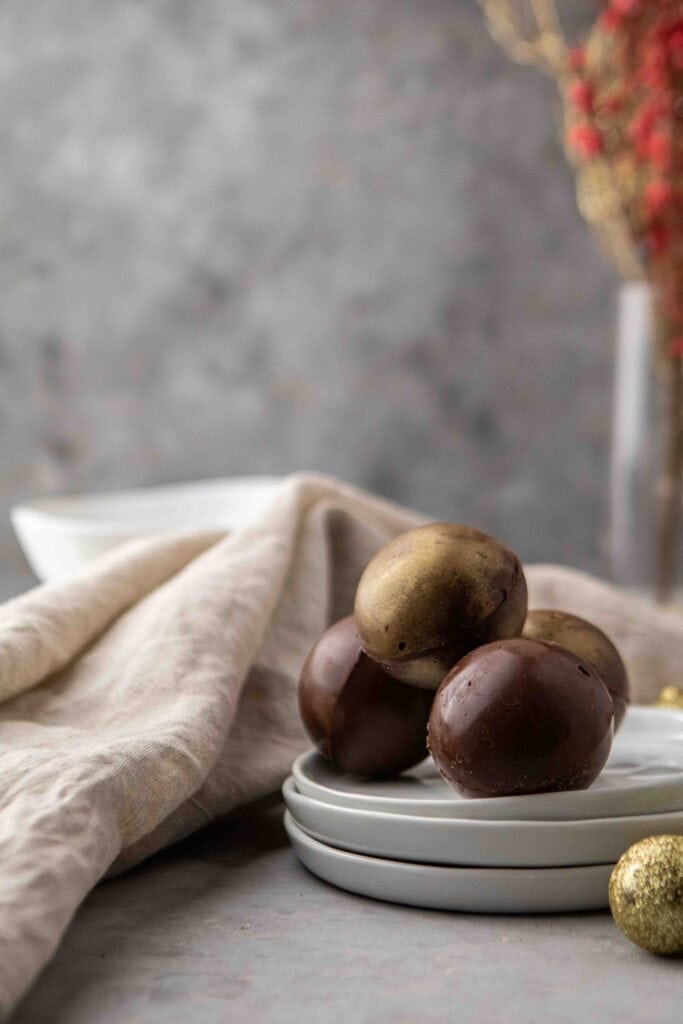Hot chocolate bombs on a plate