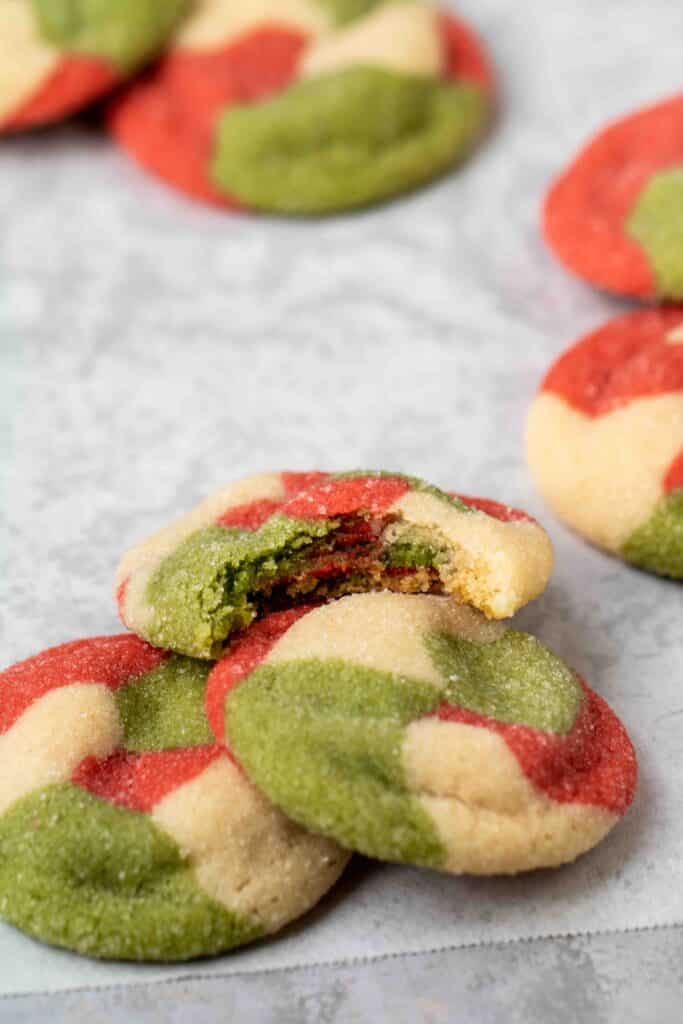 Marbled Christmas Sugar cookie with a bite taken out of it