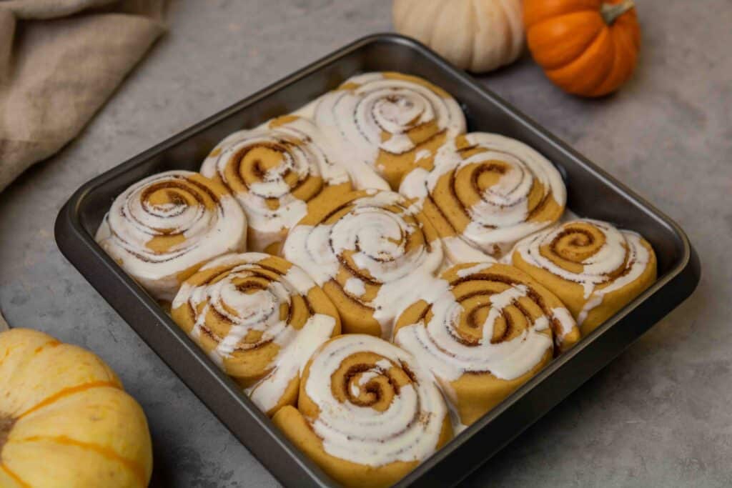 Add heavy cream to cinnamon rolls