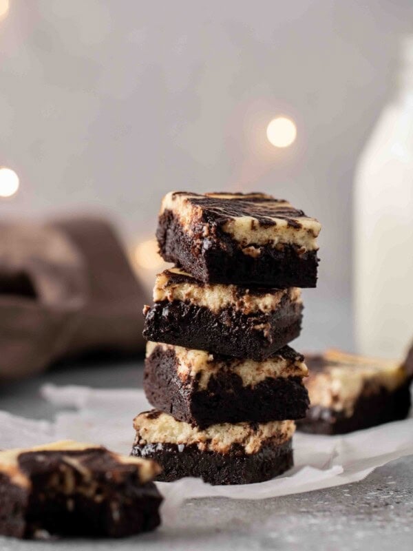 Stack of perfectly chewy cream cheese brownies
