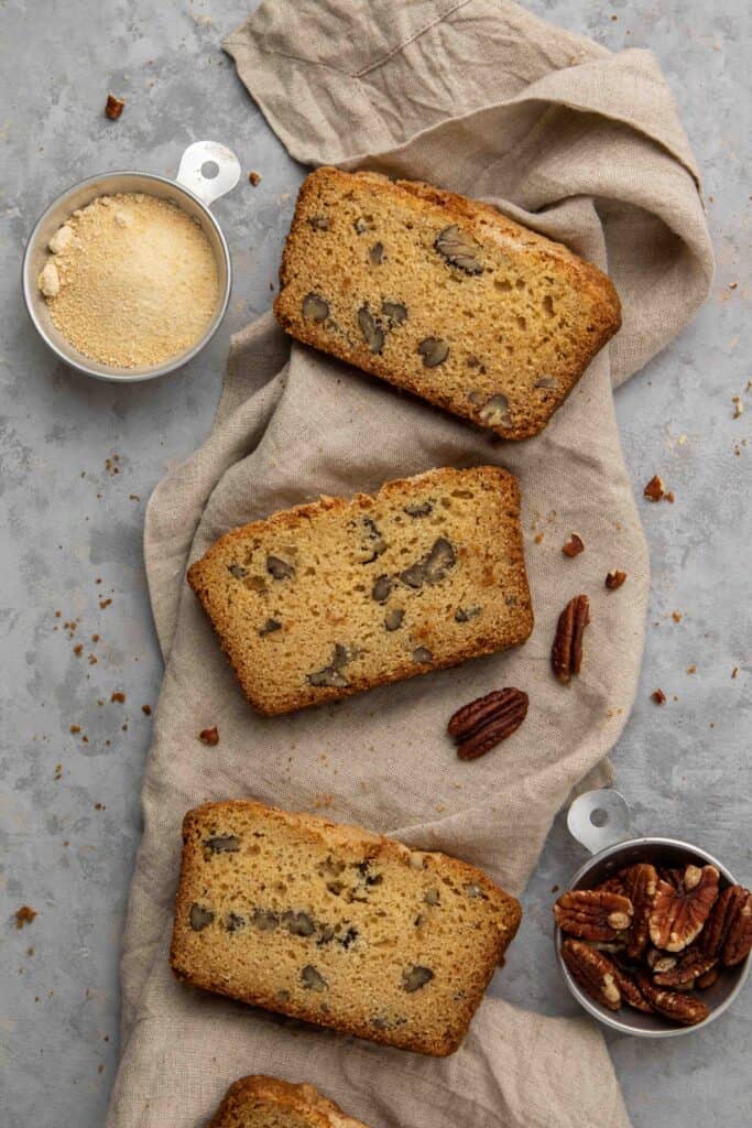 Overhead shot of maple pecan bread slices on a napkin