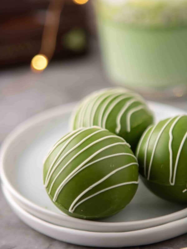 Close up of white hot chocolate green tea bombs