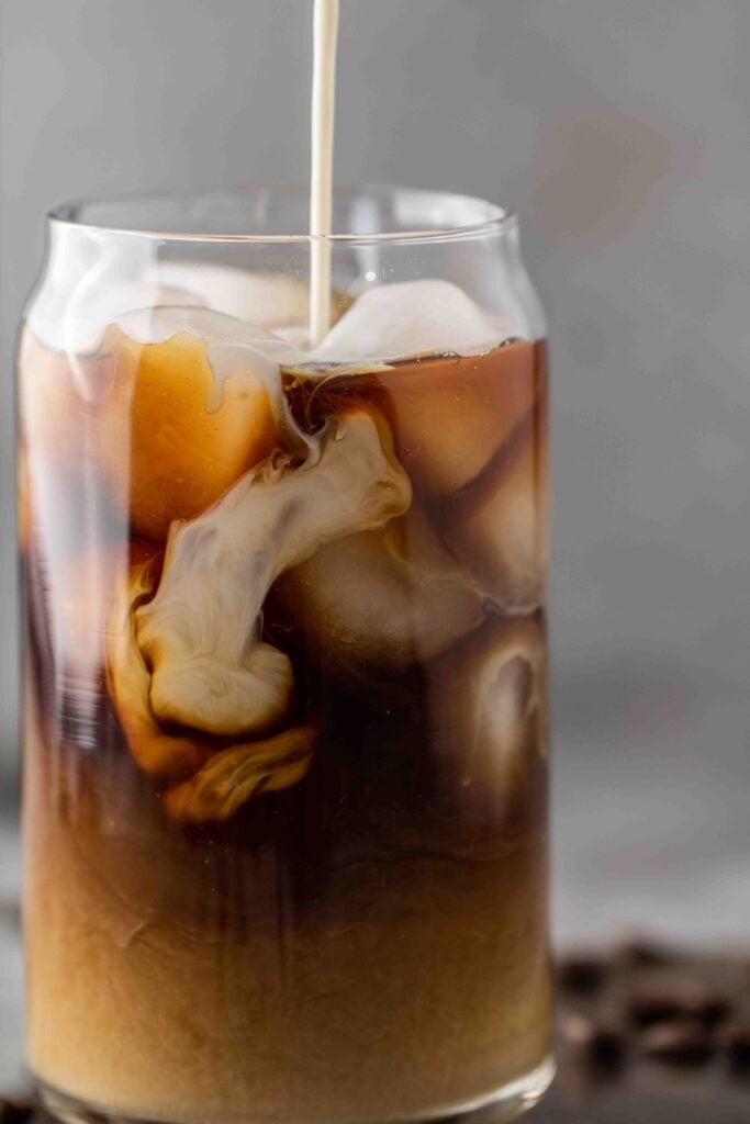 close-up-of-cold-brew-with-sweet-cream-swirls-photography