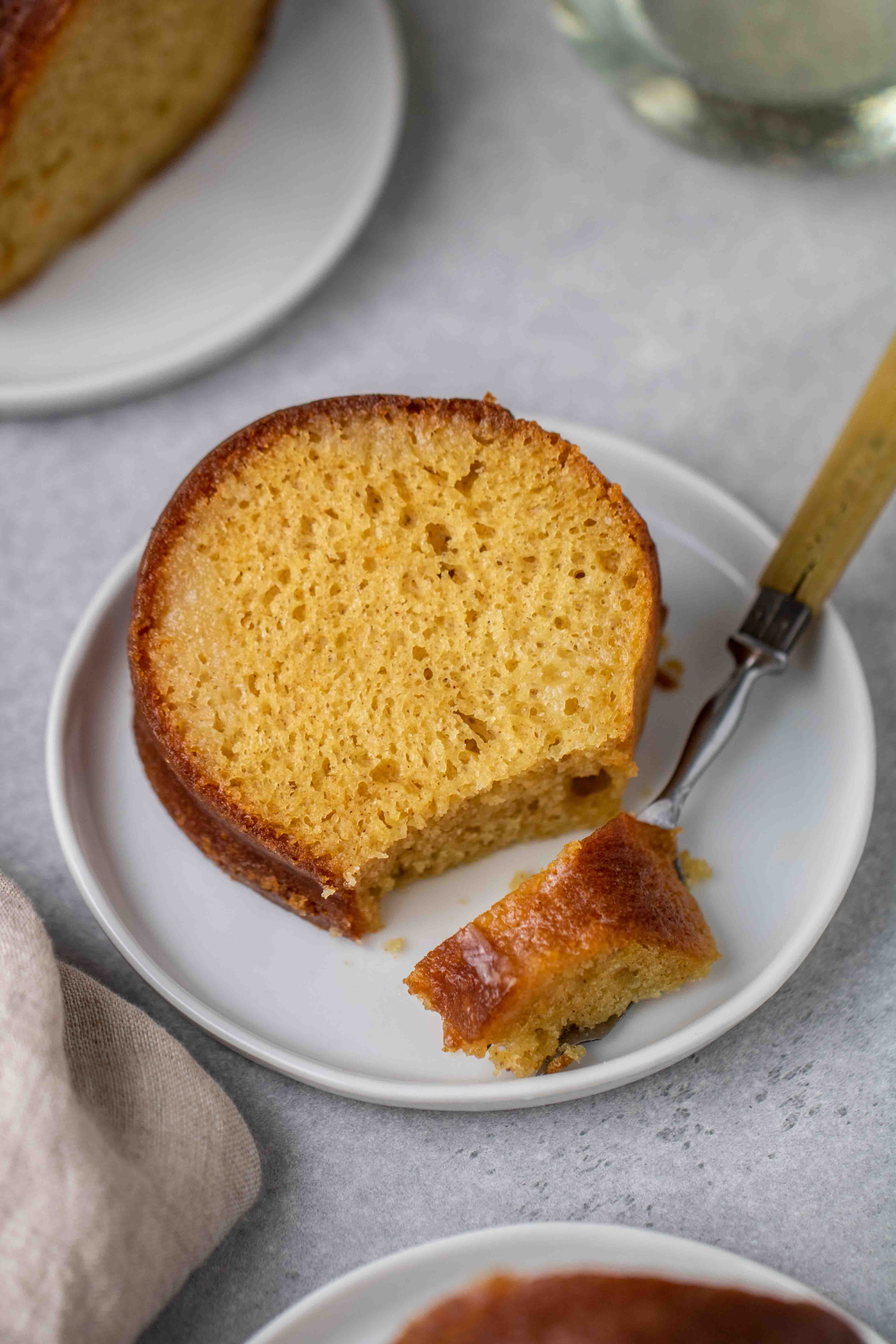 Taking a bite of the doctored up yellow cake mix bundt cake