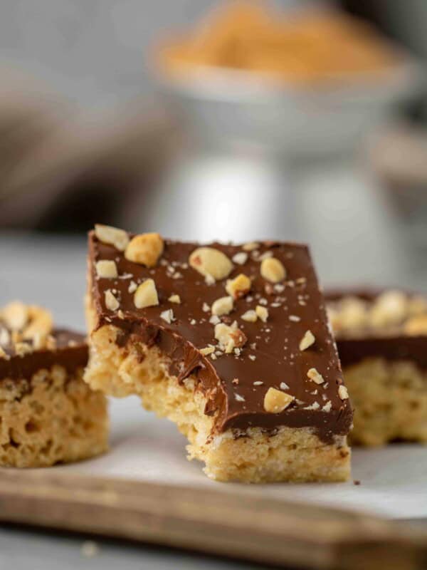 Peanut butter chocolate rice krispie treats with ganache on top