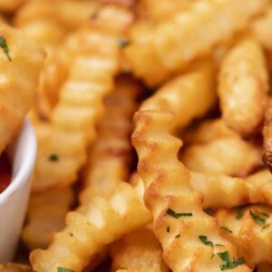 Close up of crunchy air fryer frozen crinkle fries