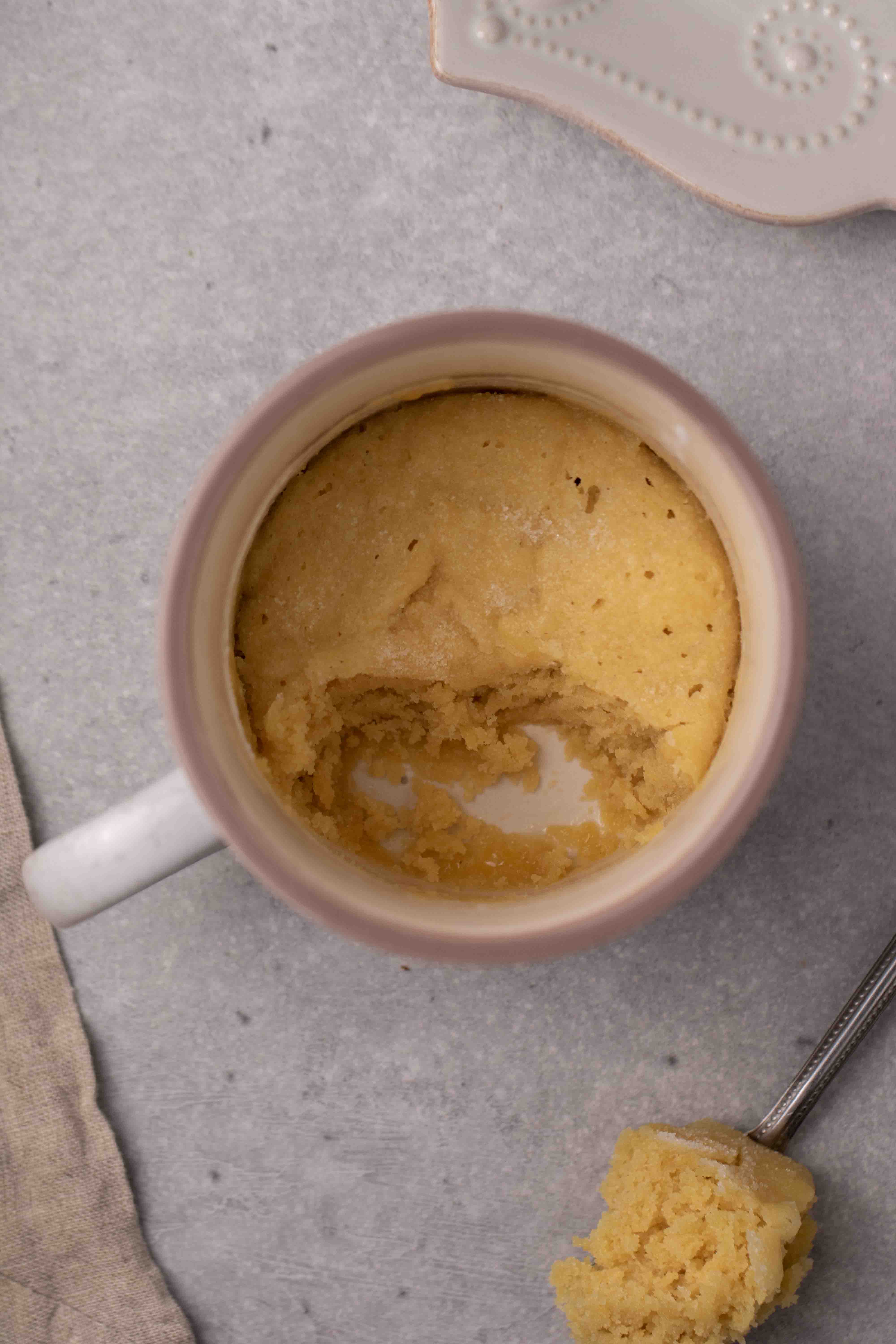 Overhead shot of texture of sugar cookie in a mug