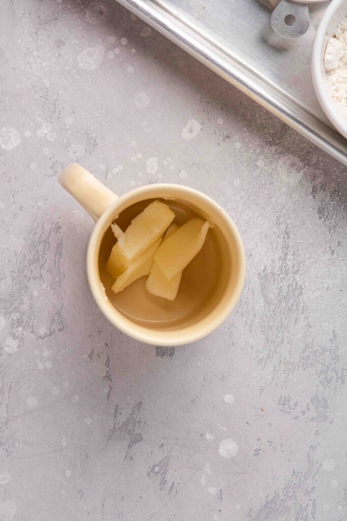 Melt the butter in the mug