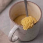 Mug sugar cookie in a spoon to see texture