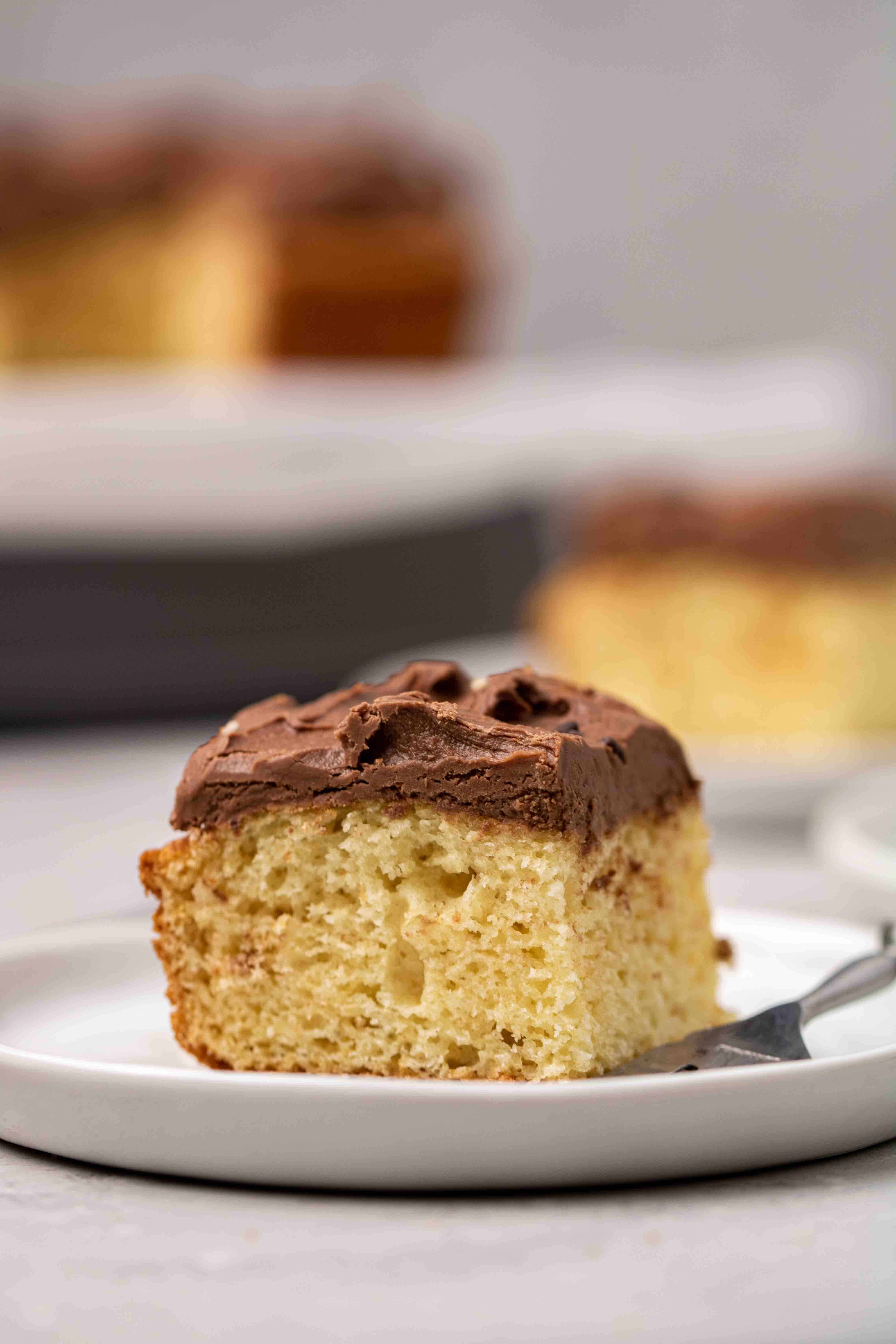 Slice of vanilla pancake mix with thick frosting