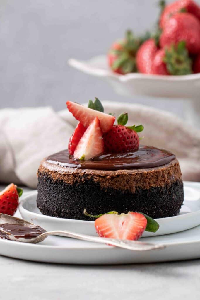 Mini chocolate cheesecake with Oreo crust and strawberry topping