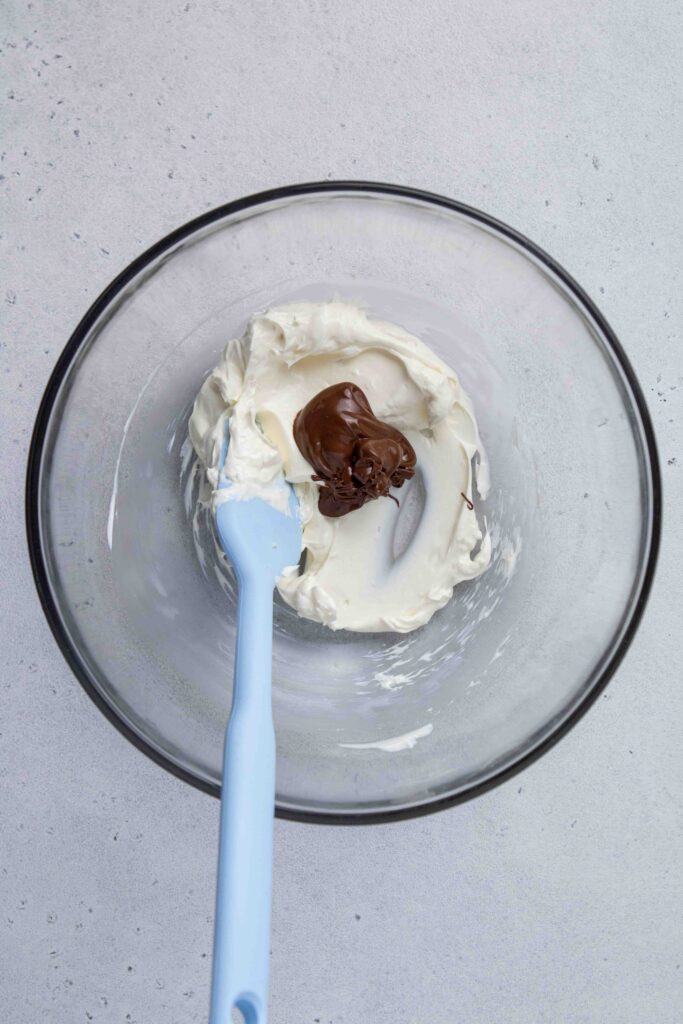 Mix the cream cheese and the chocolate together