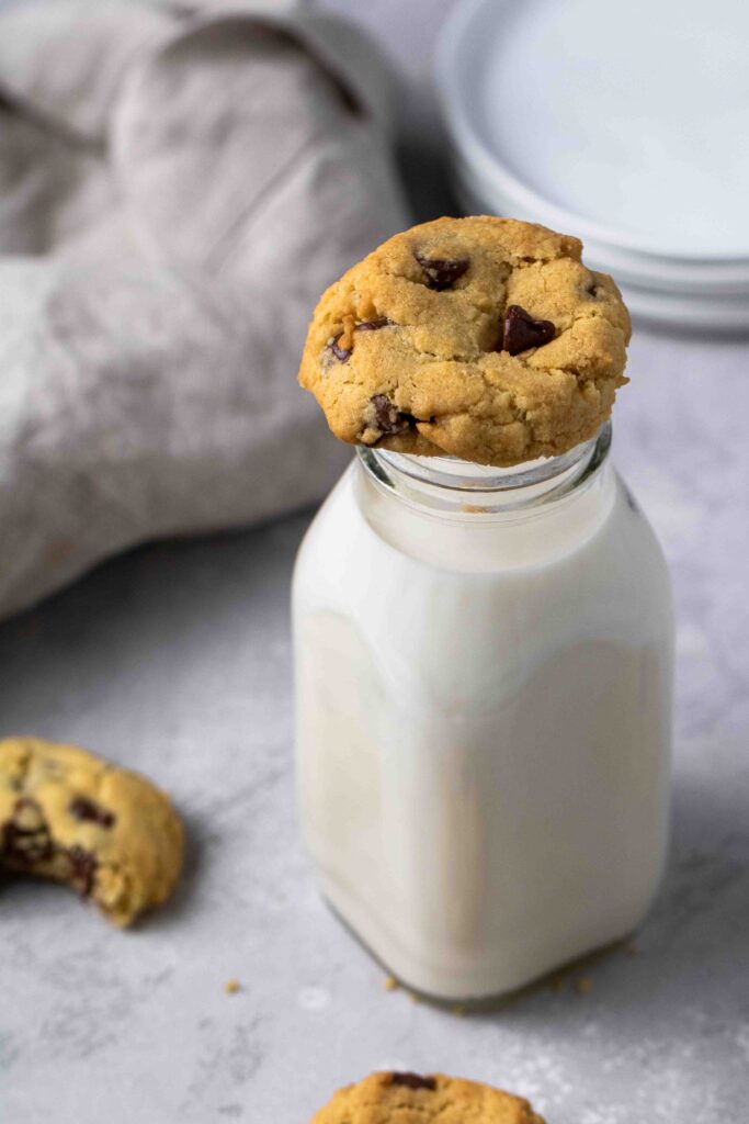 chocolate chip cookie on a milk bottle
