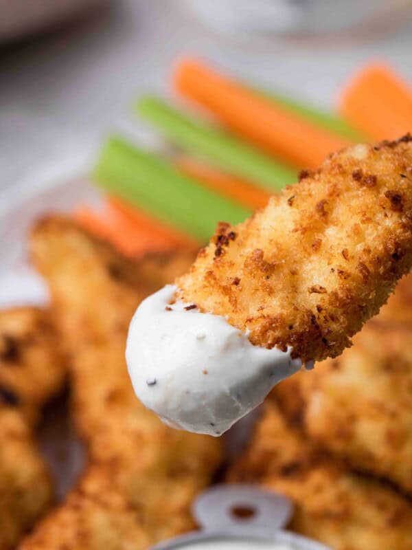 Air fryer chicken tenders dipped in ranch
