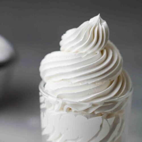 Swiss meringue buttercream piped in a cup
