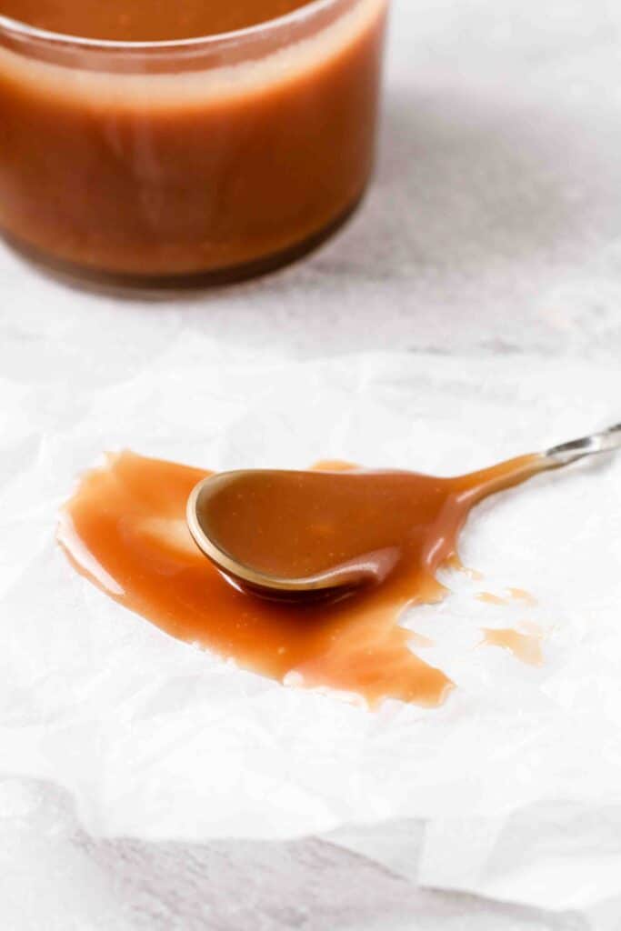 Caramel in a spoon on parchment paper