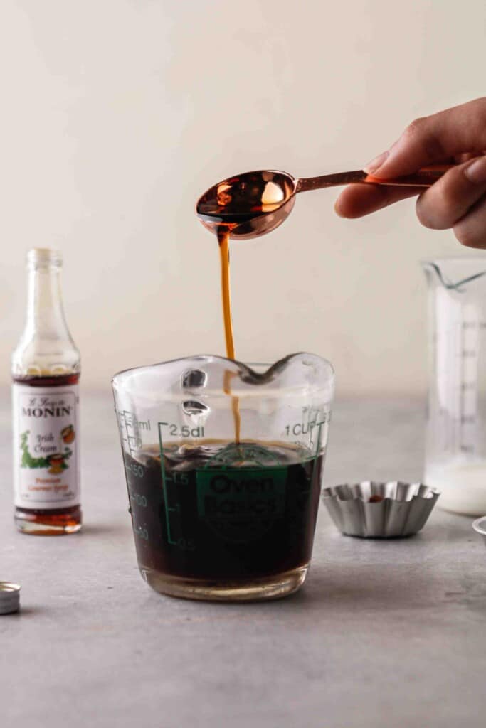 Pour the syrup into the cold brew