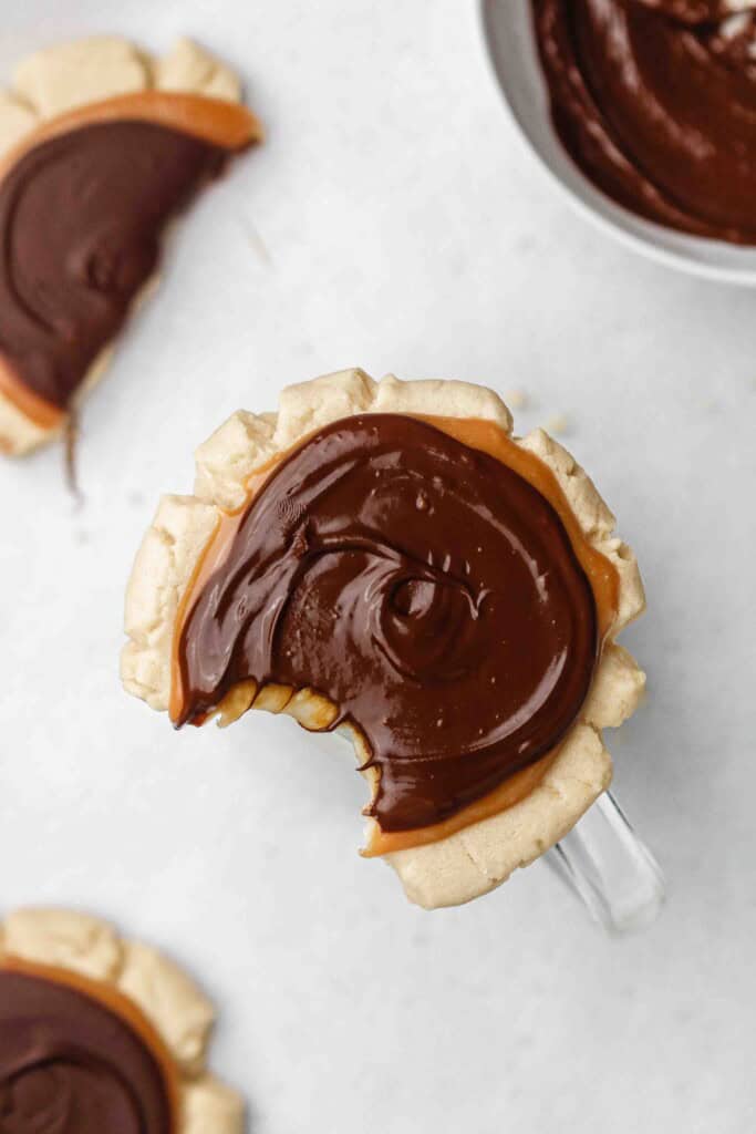 Overhead shot of a Twix cookie with a bite taken out