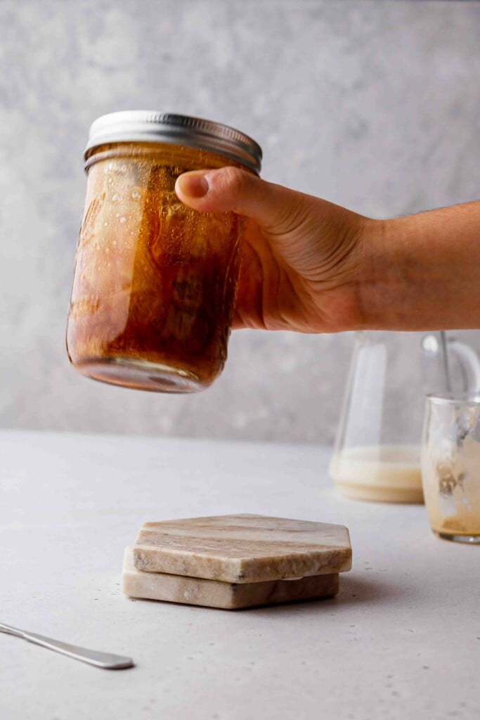 Shaking espresso shot in a jar