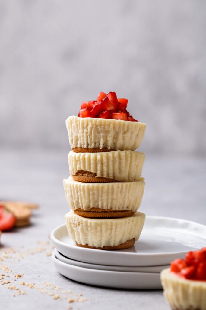 Mini cheesecake cupcake stacked on top of each other