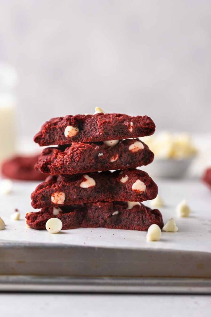 Stack of white chocolate chip red velvet cookies