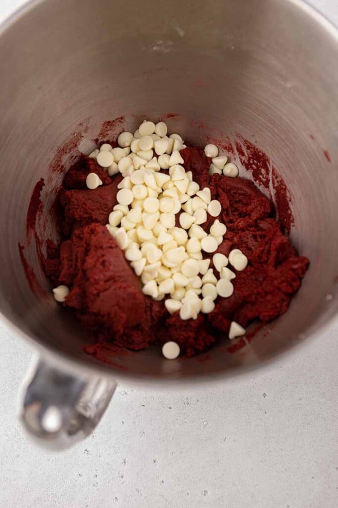 Red velvet cookie dough with chocolate chips in bowl