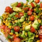 Close up of summer roasted corn salad with avocados