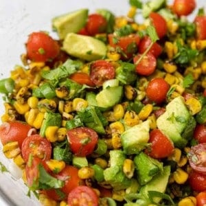 Close up of summer roasted corn salad with avocados