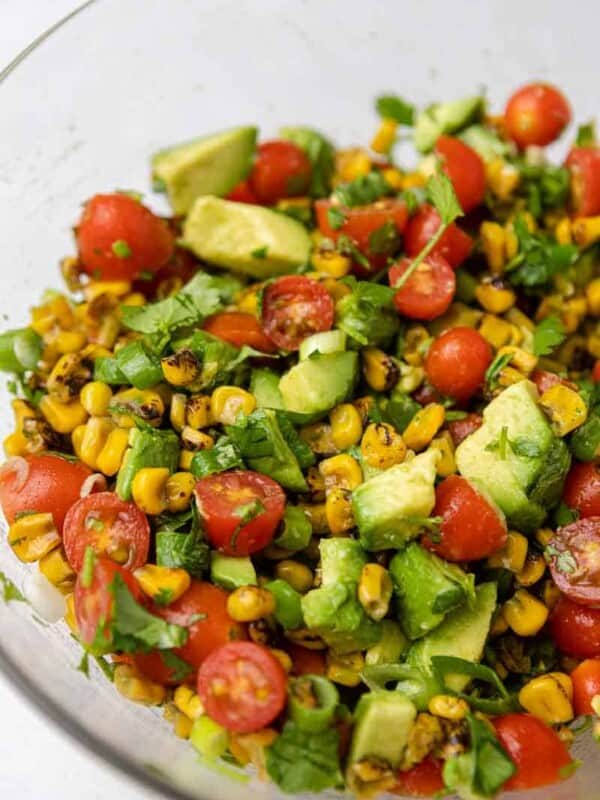 Close up of summer roasted corn salad with avocados